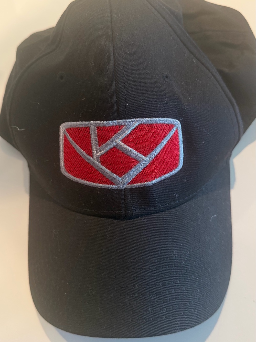 New Era Black Cap with Red & Gray Interior Patch